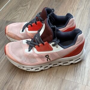 On Running Coral and Burgundy Sneakers